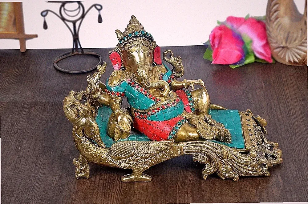 Brass Idol Ganesha Statue Relaxing On Peacock Recliner Figurine